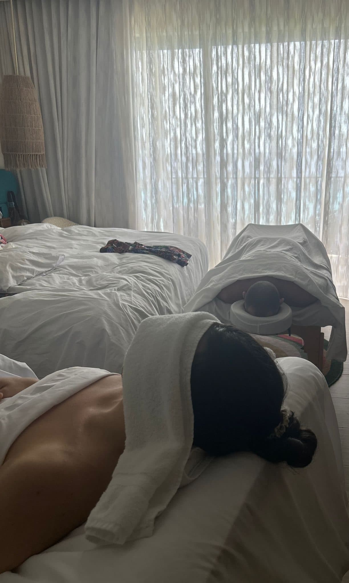 Two guests resting on massage tables during a couples spa day in Barbados
