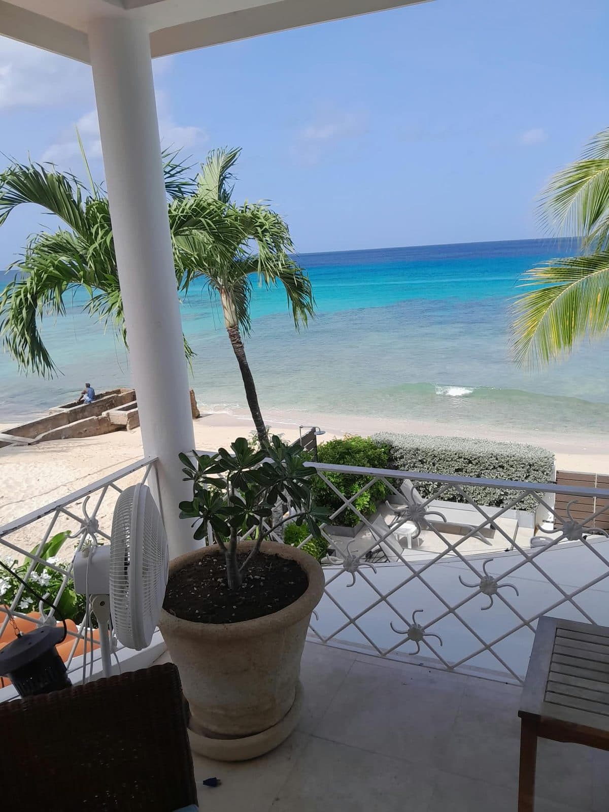Beach terrace, turquoise water, massage in Barbados